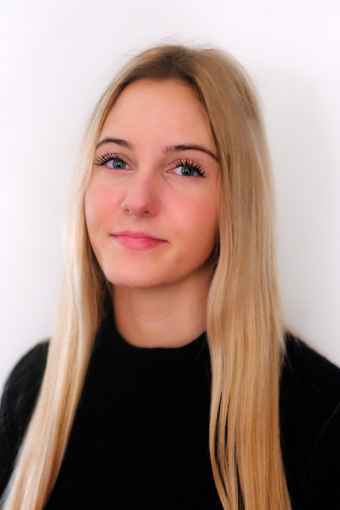 Mila Frackiewicz — Front Desk Coordinator